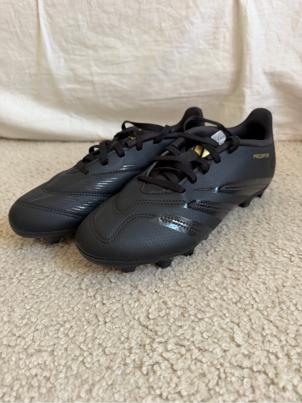 adidas Black Soccer Cleats with Gold Accents